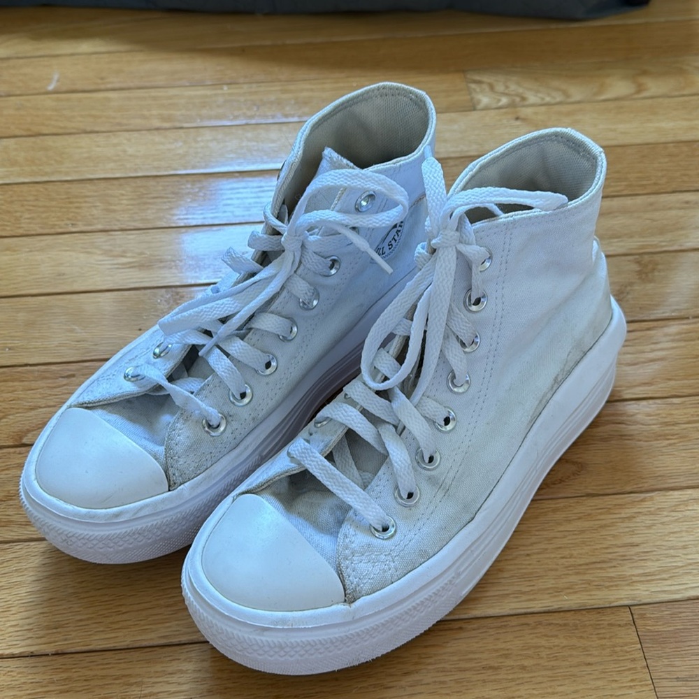 High top white Converse with platform